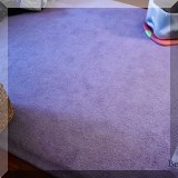 D21. Purple area rug. 7'6&rdquo; x 11'2&rdquo; 
